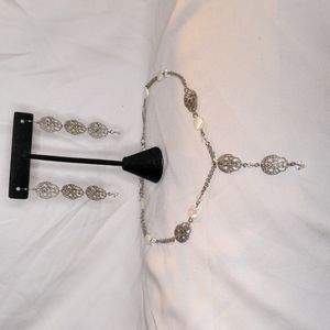Silver necklace and earrings set